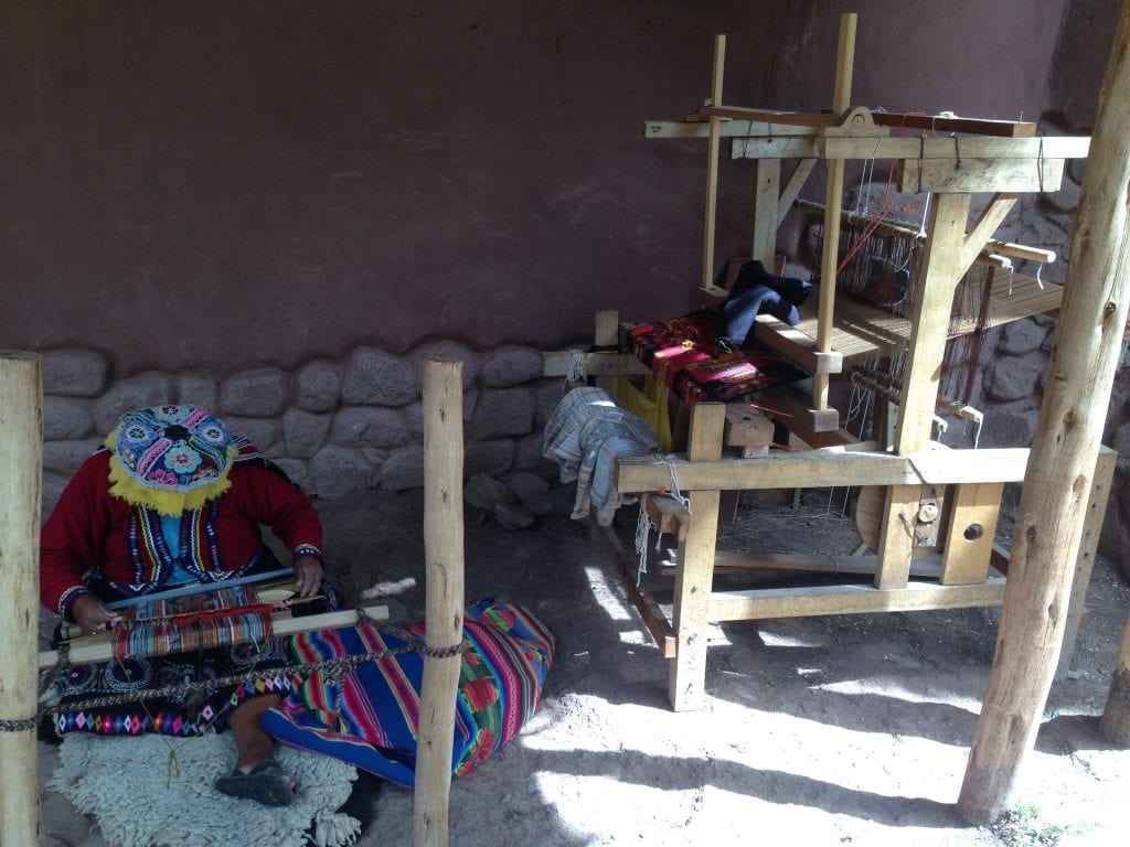 Native Peruvian women weaving their hand-spun alpaca wool into beautiful linens, blankets and clothing 